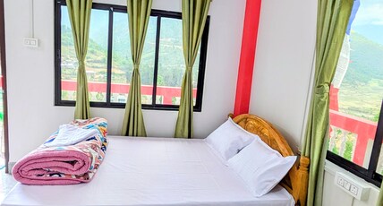lhamu homestay Room Type - Deluxe double bed room with balcony/ hills view