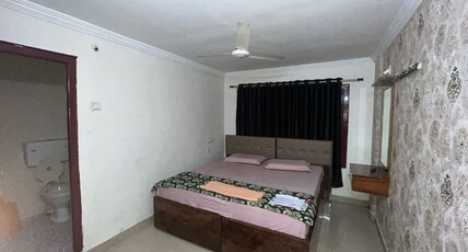 Tilak Grand Inn Room Type - Deluxe Room AC