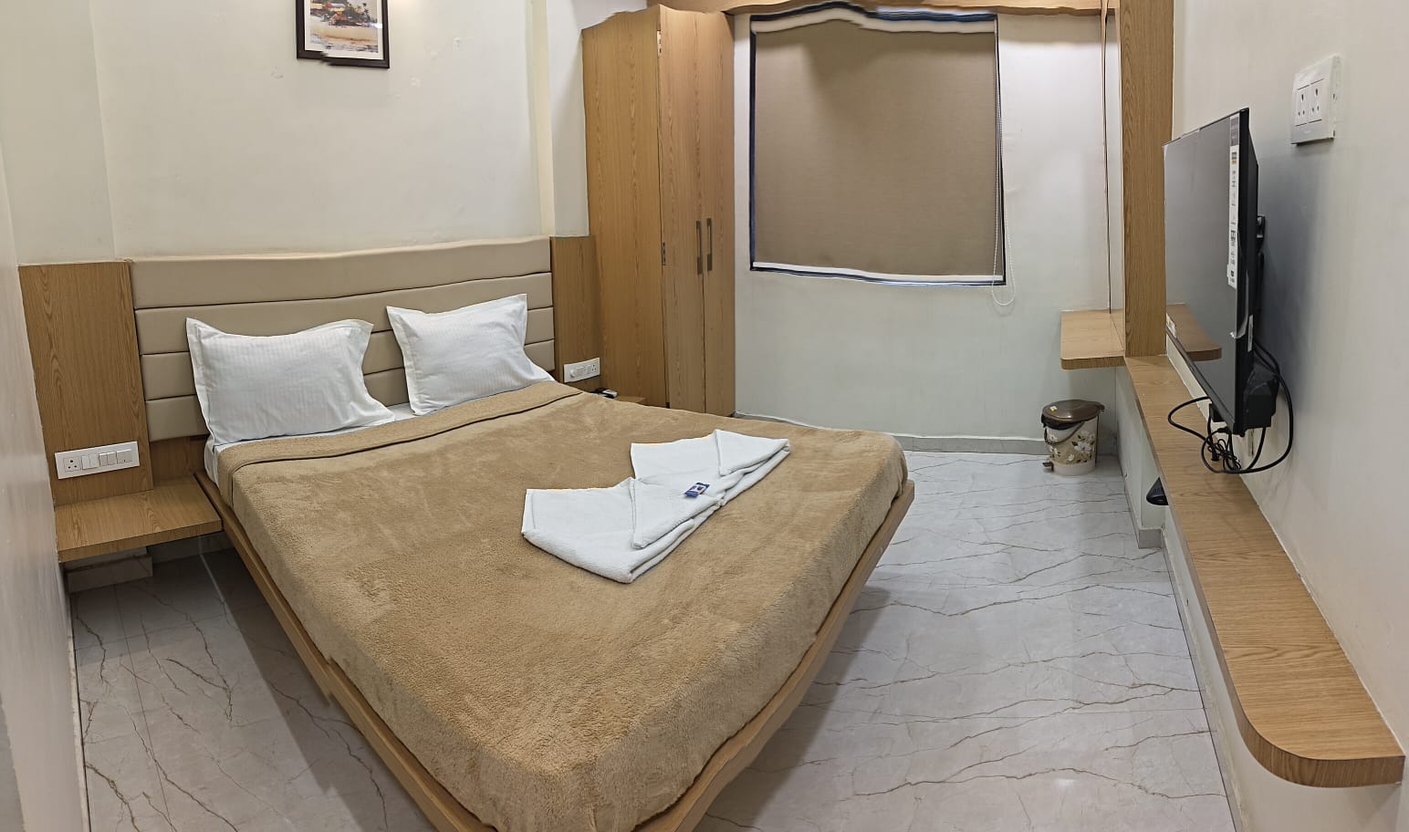 Hotel Sai Pratham - Tap to explore photos
