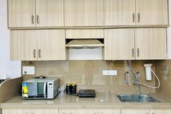 Cozy 2BHK with Balcony and Kitchen Orange Orchid