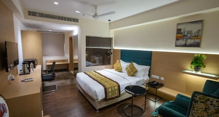 Hotel Midori Vithalapur Room Type - Deluxe Room.