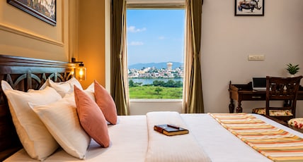 Revaas Pure Veg Lake View Hotel Room Type - Lake View Room l Free Pick Up (Train Or Bus Station - 8AM-8PM) l Welcome Drink l Food Discount Revaas Pure Veg Lake View Hotel Room Type - Lake View Room l Free Pick Up (Train Or Bus Station - 8AM-8PM) l Welcome Drink l Food Discount