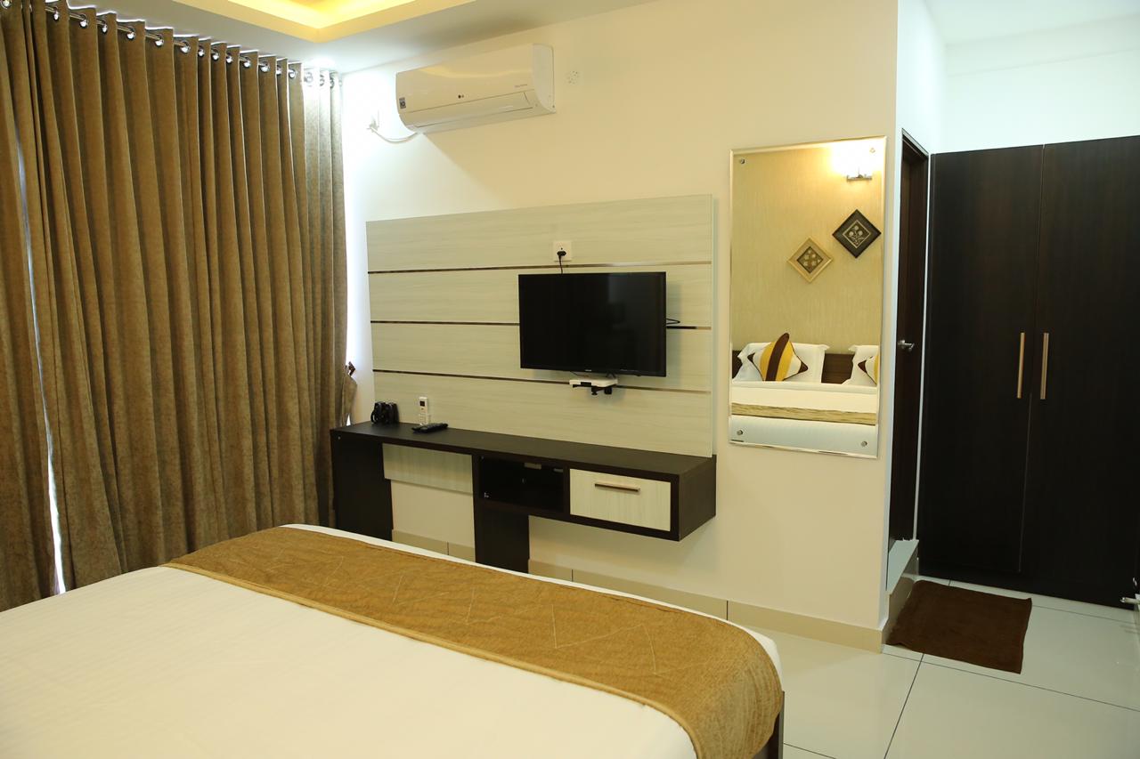 Eden Isle Luxury Service Apartments - Tap to explore photos