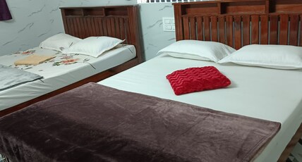 Kubera Rooms and restaurant Room Type - Deluxe AC Room 4 Pax