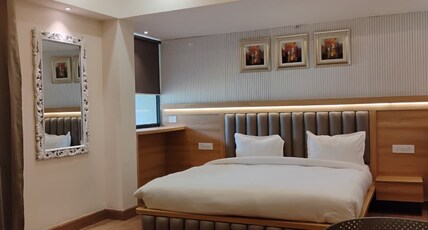 The Whispering Winds Resorts Room Type - Premium AC Mountain retreat with Balcony
