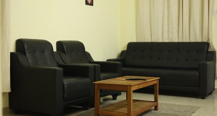 Sri Sai Grande Inn. Room Type - Deluxe Room with Hill View