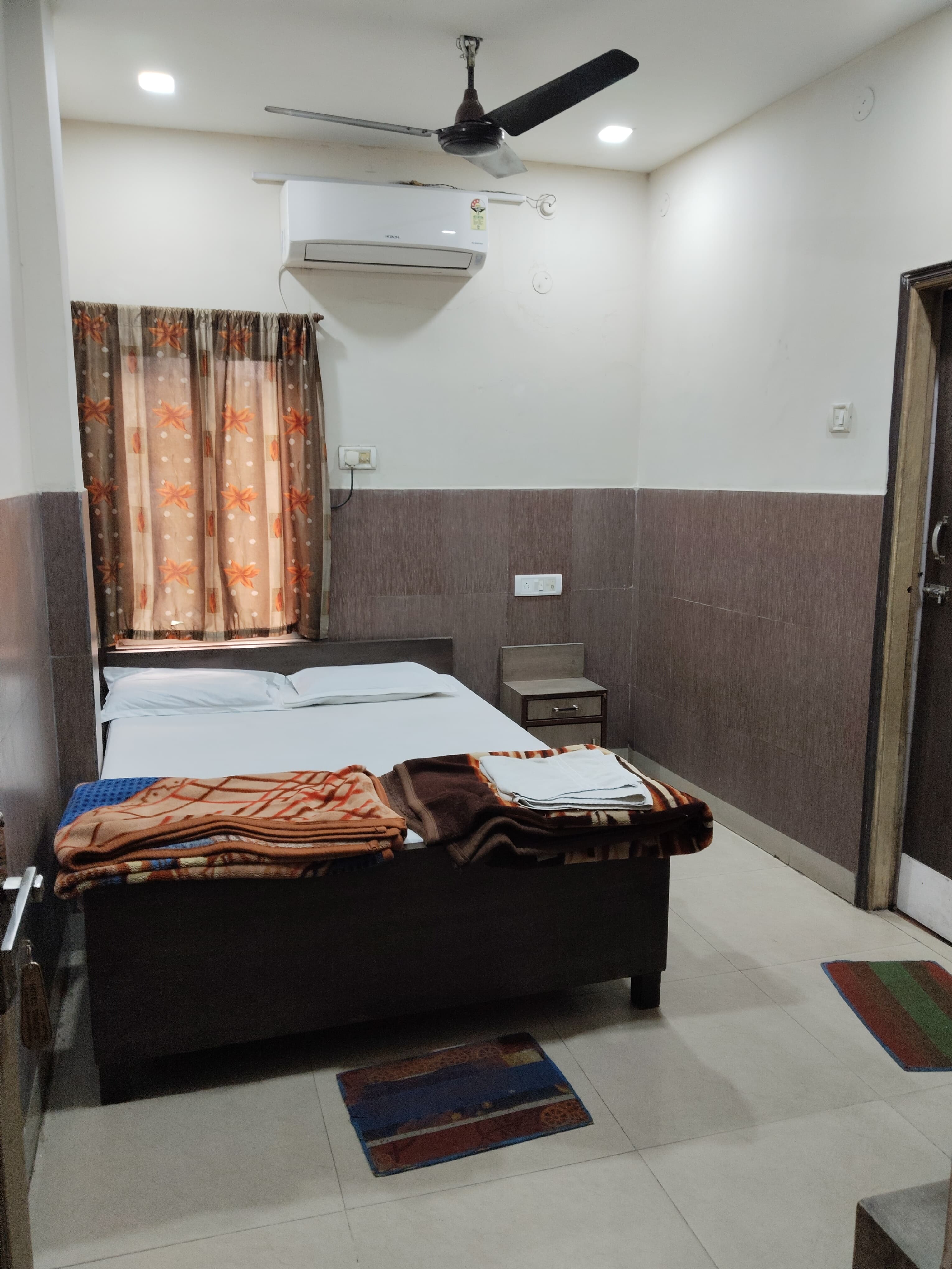 Hotel Trimurti - Tap to explore photos