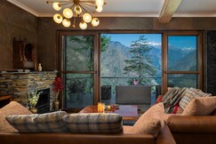 SaffronStays Hillstation over Tirthan Valley near GHNP and treks