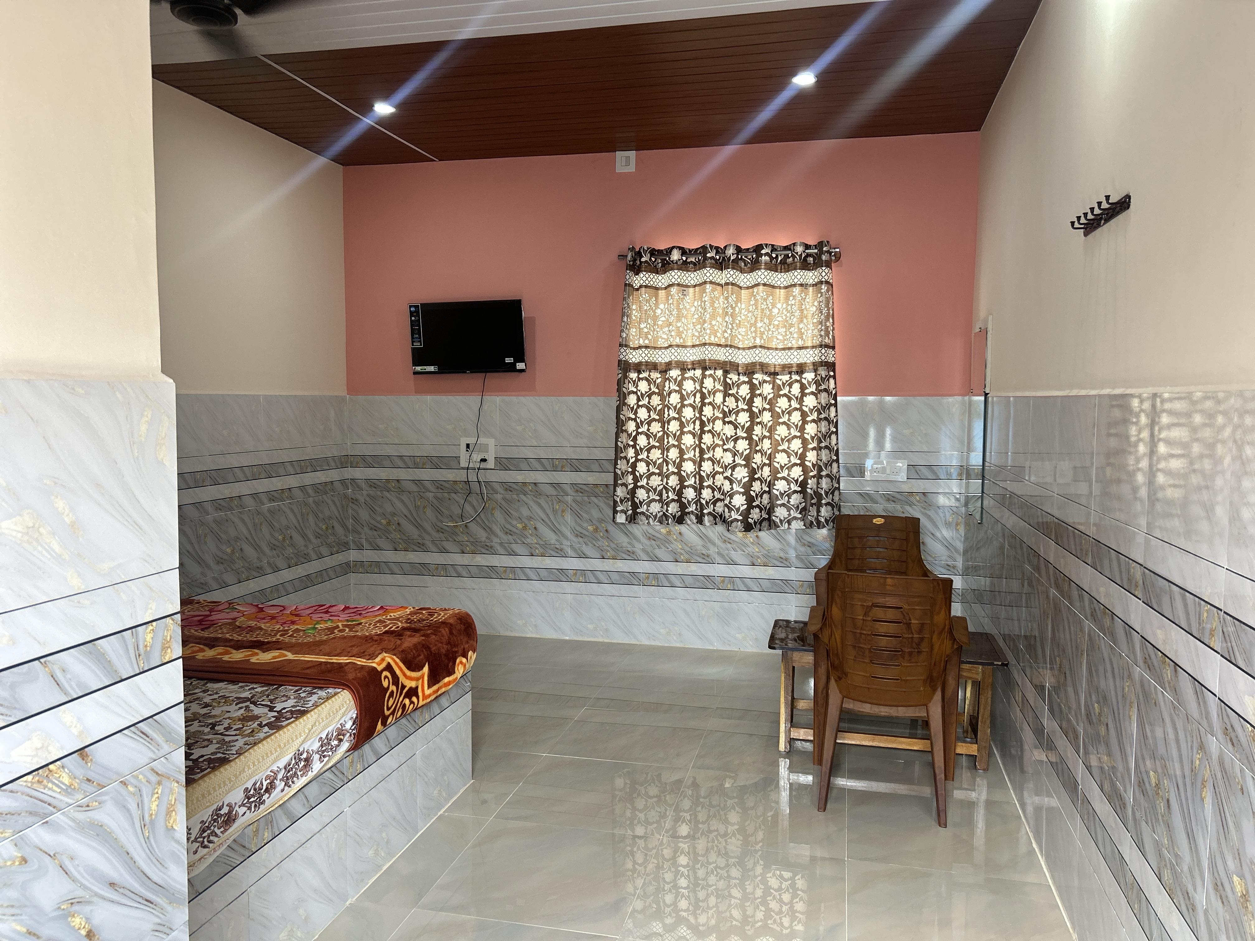 Hoysala Rooms - Tap to explore photos