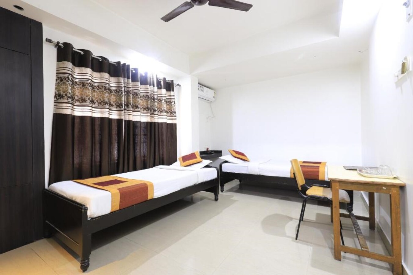 Hotel Rashmi - Tap to explore photos