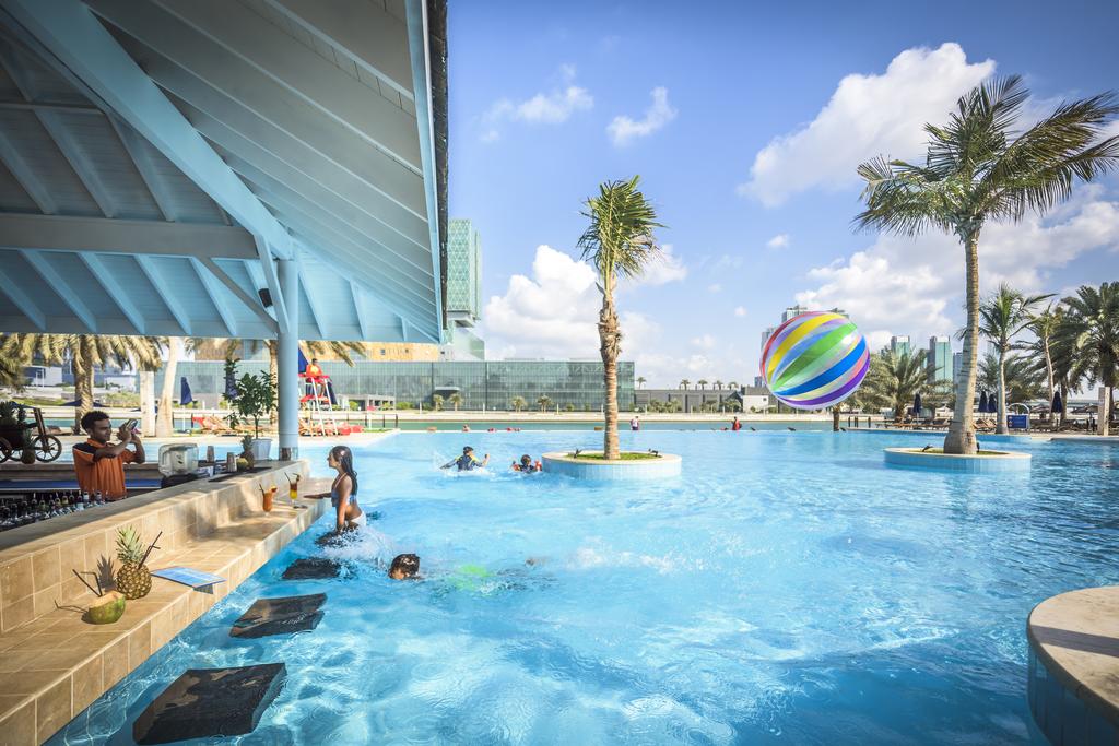 Beach Rotana - Tap to explore photos