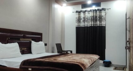 HOTEL SAMRAT PALACE Room Type - AC DELUXE BEDROOM