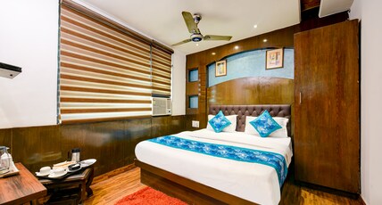 Hotel Le grand Roof Top restaurant -Walk -in  from Rk Ashram  metro Station Room Type - Queen Bed with Smart TV