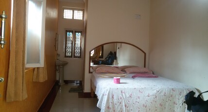 Lakshmi Heritage Tourist Home | Rooms & Guided Treks Room Type - Standard AC Room
