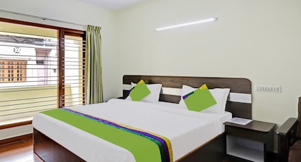 Treebo Aall Season Room Type - Deluxe Family Room Treebo Aall Season Room Type - Deluxe Family Room
