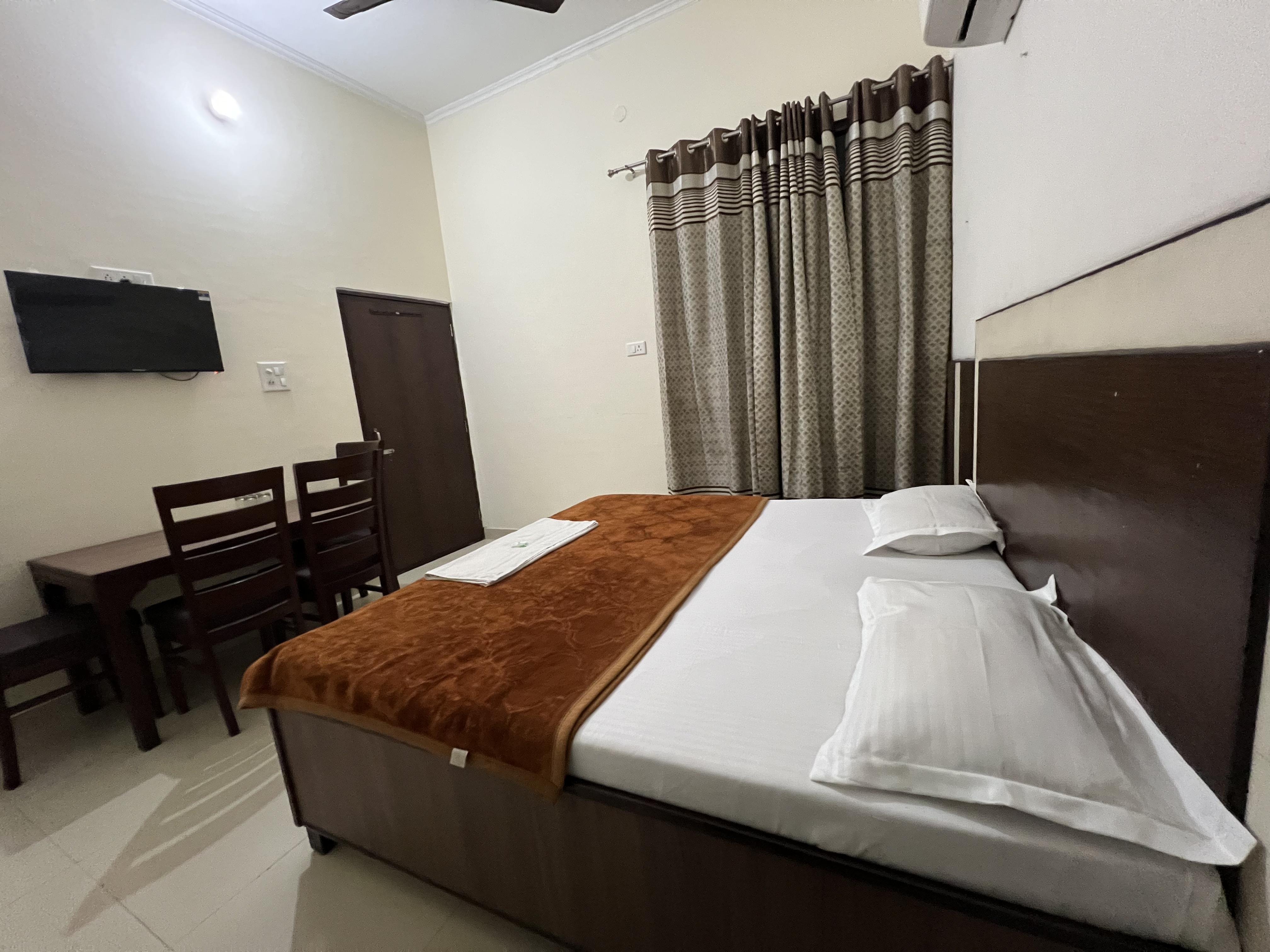 Raja Guest House, Near Railway Station - Tap to explore photos