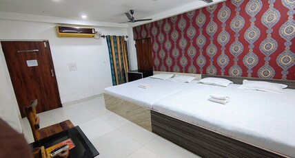 STAYMAKER Gharana Hotel and Resort Room Type - Quad Room AC
