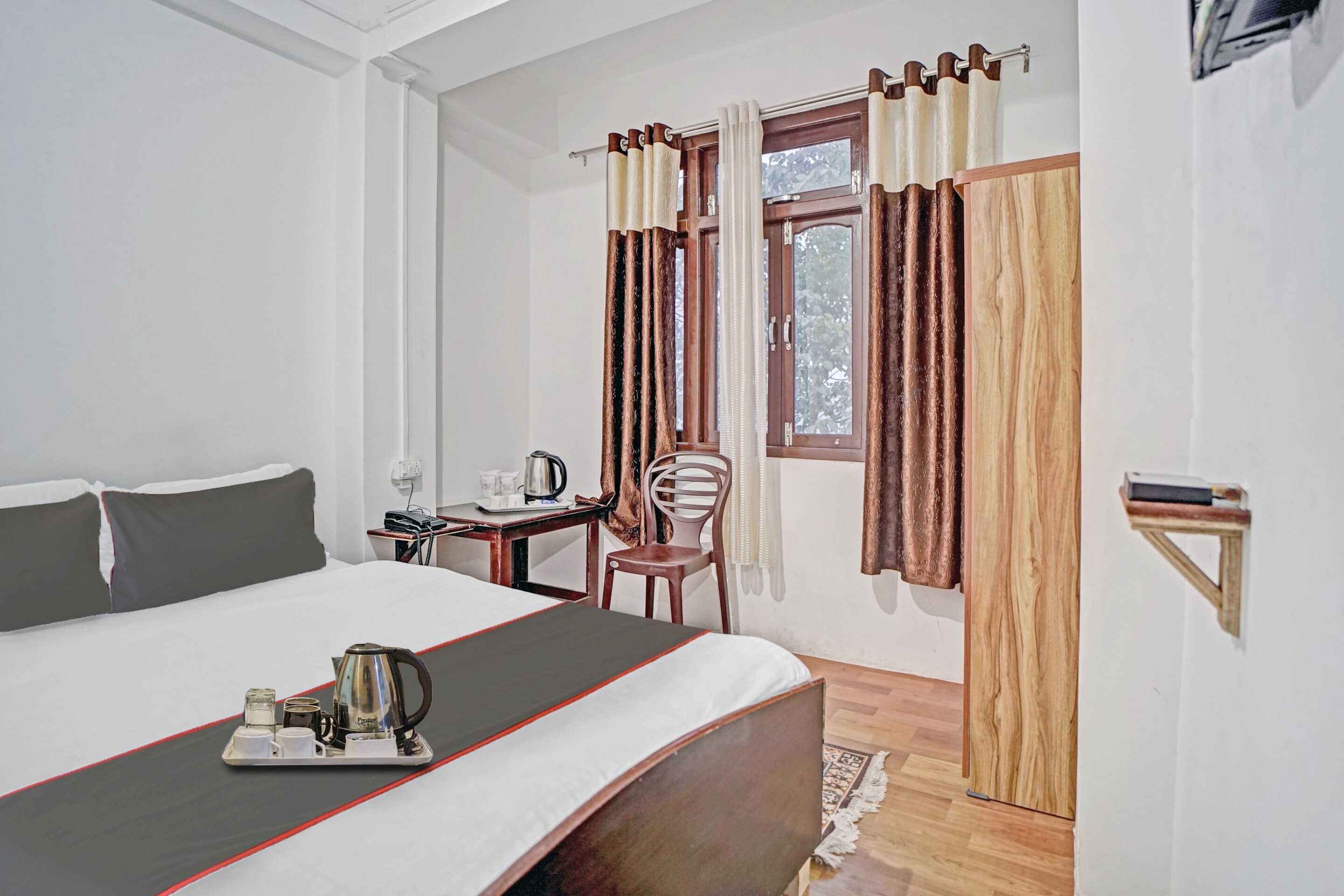 Hotel O Laxmi Niwas - Tap to explore photos