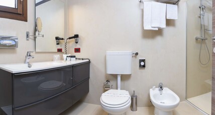 Best Western Plus Hotel Modena Resort Room Type - Suite-1 King Bed, Non-Smoking, Separate Building, Living Room, Double Sofabed, 2 32 Inch Led Tvs Best Western Plus Hotel Modena Resort Room Type - Suite-1 King Bed, Non-Smoking, Separate Building, Living Room, Double Sofabed, 2 32 Inch Led Tvs