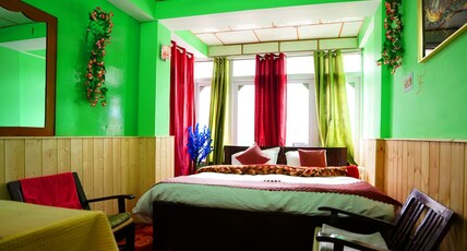 Ashiana Guest House. Room Type - Luxury King Bed Room with Hill View