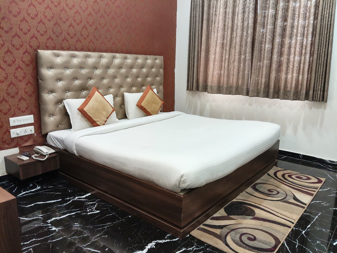 Hotel Ashoka Grand - Tap to explore photos