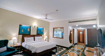 Ramada by Wyndham Udaipur Resort and Spa Room Type - Super Deluxe Room, Private Sitting Area, Garden and City Views ( All meals )