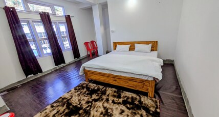 Accomoon hotels Room Type - Double bed deluxe with balcony/ hills view