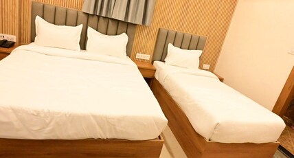 hotel banaras vandanam Room Type - Deluxe Triple Sharing AC Room