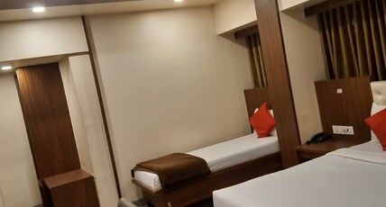 Manoram Hospitality Room Type - AC Double Bed
