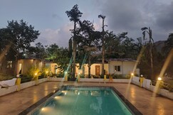 Tranquil Haven 2 BHK with Pool Nature Getaway