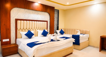 Hotel Dinanath (Free Gated Parking & 10 Minutes Walk from Temple) Room Type - Suite Room ( 1 Double Bed + 1 Single Bed ) Hotel Dinanath (Free Gated Parking & 10 Minutes Walk from Temple) Room Type - Suite Room ( 1 Double Bed + 1 Single Bed )