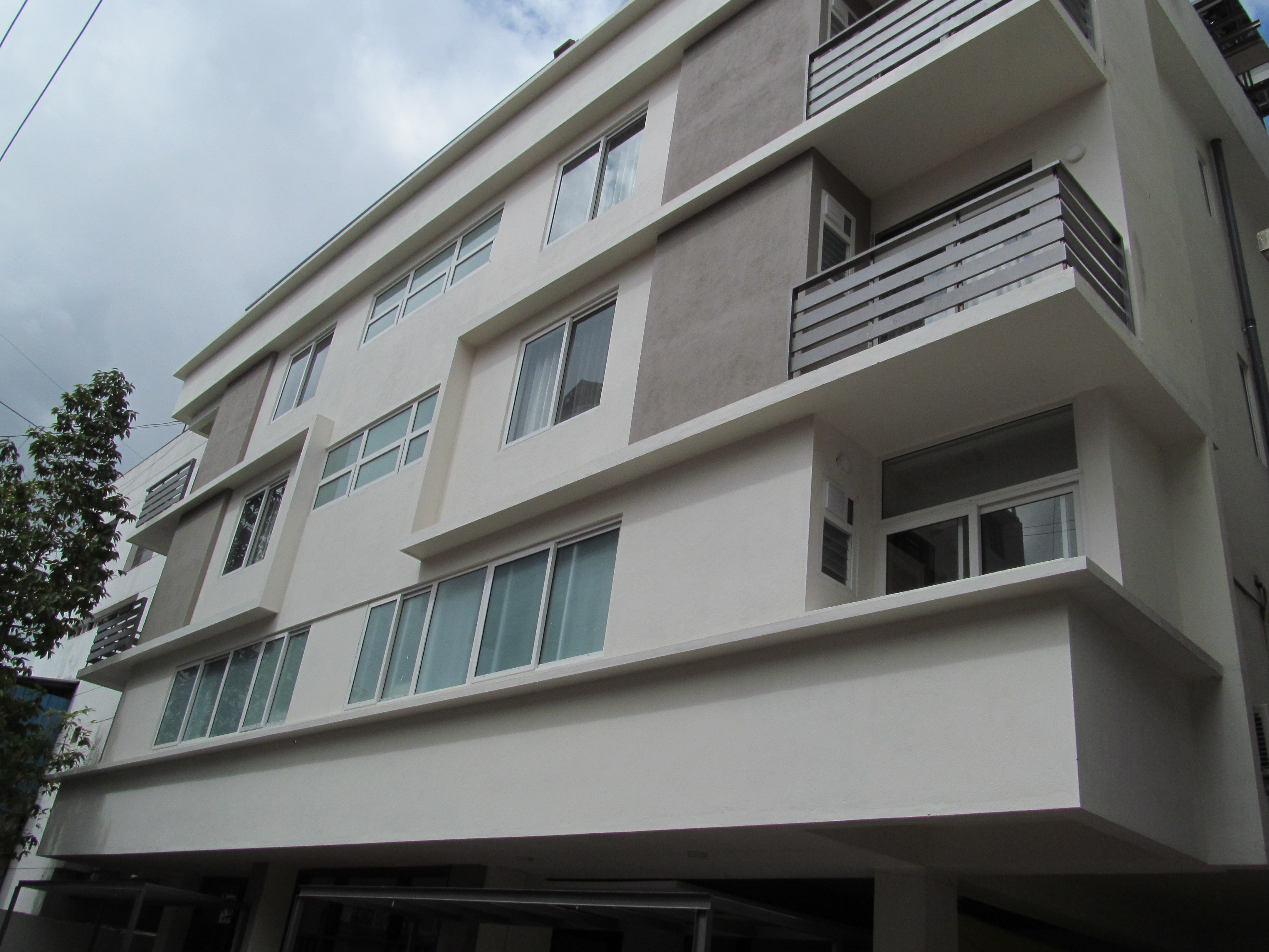 Ixora Suites (Near 100 Ft Rd & Indiranagar Metro Station) - Tap to explore photos