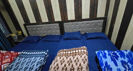 Rajkamal Guest House Room Type - Double Queen Beds with Mountain View