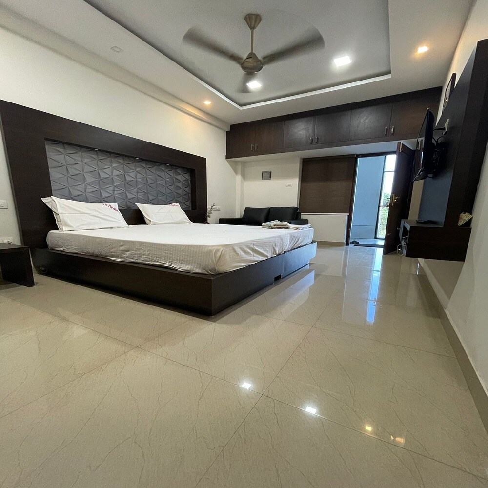 Redbell Suites, Pantheeramkavu - Tap to explore photos