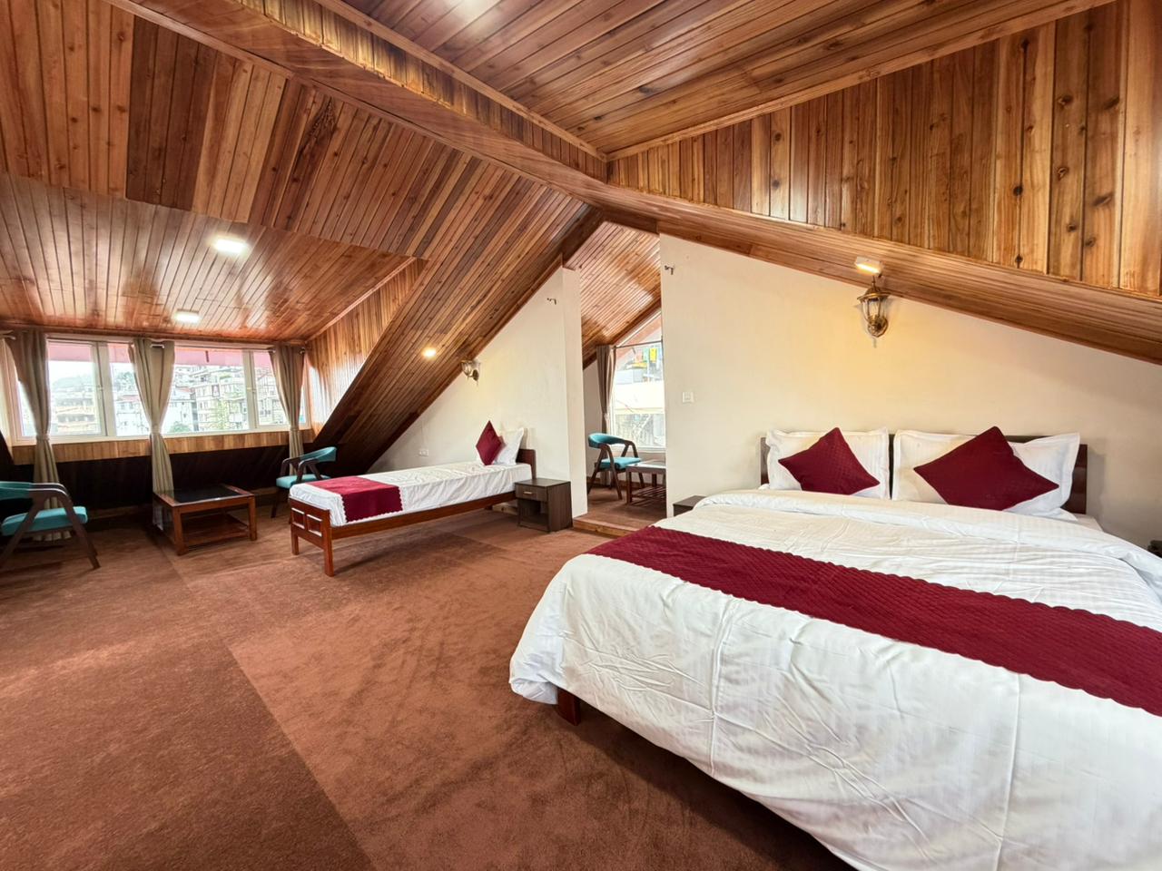 JAIN GROUP HOTEL PINK MOUNTAIN DARJEELING - Tap to explore photos