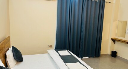 KAMYA'S RESIDENCY Room Type - Deluxe King Bed with Balcony