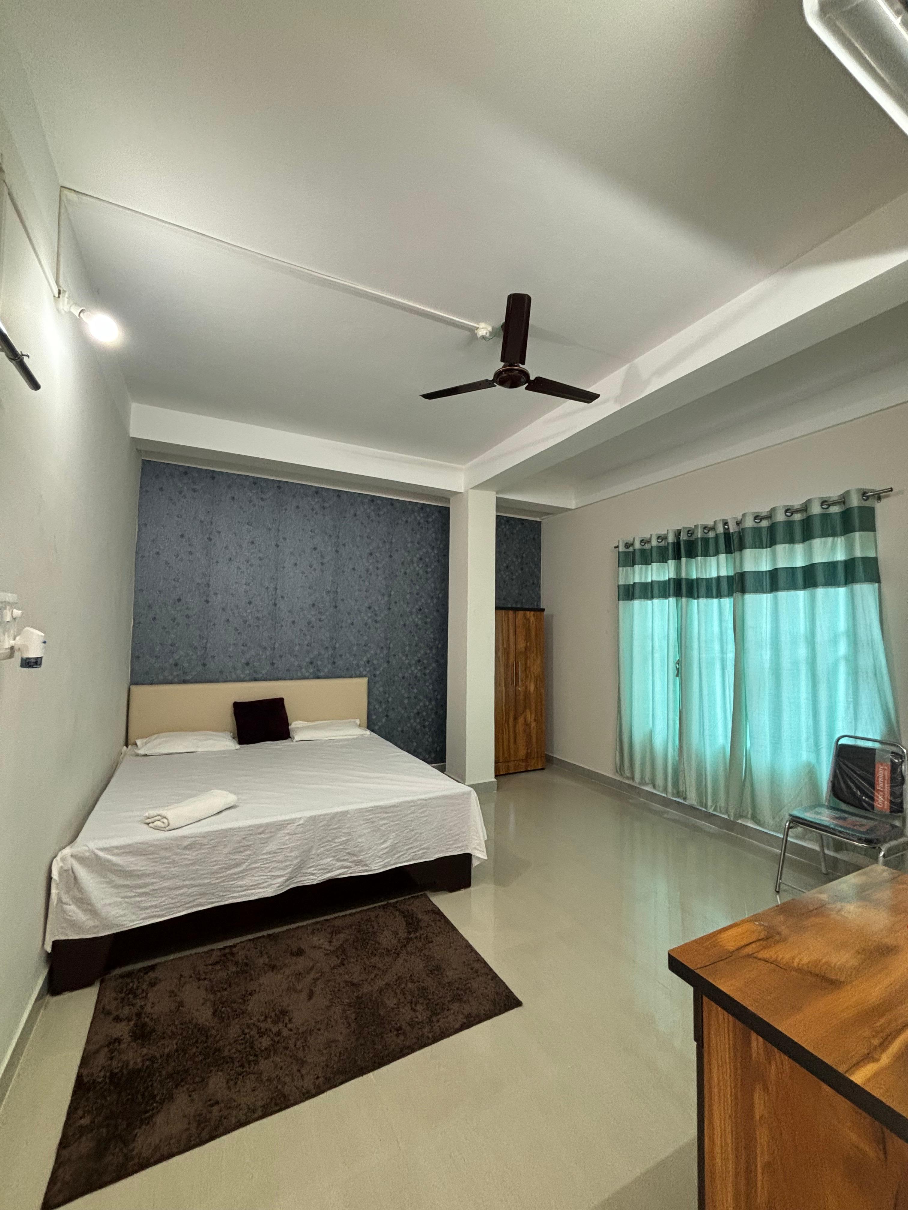 Blue Paradise Homestay - Tap to explore photos