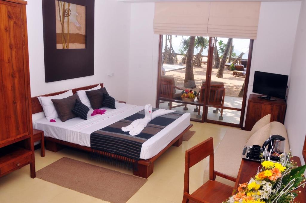 Pandanus Beach Resort & Spa - Tap to explore photos