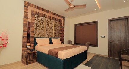 Paradise grand hotel nd resort Room Type - Deluxe Rooms