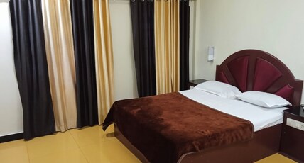 Grey Inn Stays Room Type - AC STANDARD ROOM