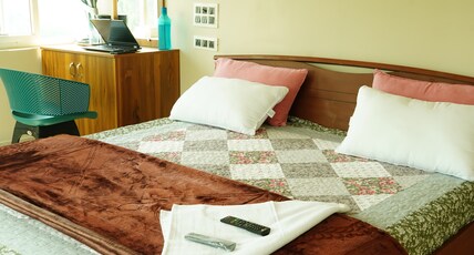 Vasu Inn| Rooms & Caretaker Room Type - Premium Single with Balcony