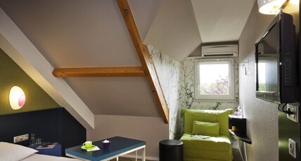 ibis Styles Perigueux Trelissac Room Type - AIR-CONDITIONED TRIPLE ROOM WITH 1 DOUBLE BED AND 1 SOFA BED