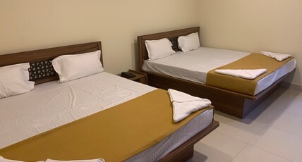 Hotel Santhosh Inn Room Type - Deluxe Four Bed AC Room