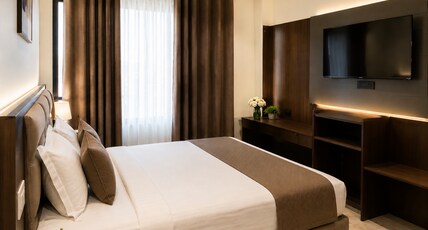 The Prominence Premium Hotel & Cafe Room Type - Deluxe Double Room