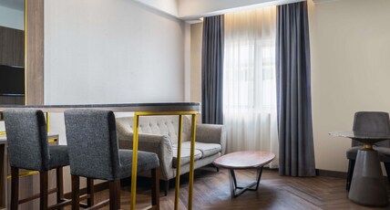 Mercure Jayapura Room Type - Executive Suite with 1 kingsize bed and sofa