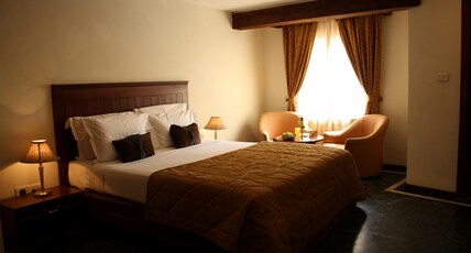 Amrutha Castle Room Type - Deluxe Room