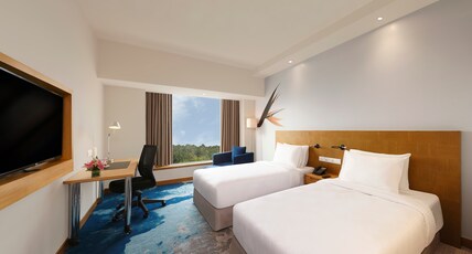 Novotel Hyderabad Convention Centre Room Type - Executive Premier Room with Twin Bed, One-Way Airport Transfer & Premier Lounge Access Novotel Hyderabad Convention Centre Room Type - Executive Premier Room with Twin Bed, One-Way Airport Transfer & Premier Lounge Access