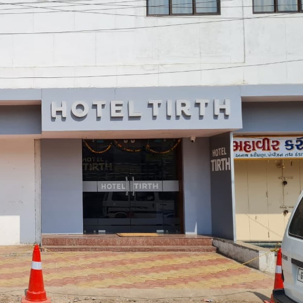 HOTEL TIRTH - Tap to explore photos