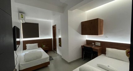 Pod n Beyond Smart Hotel @Bistupur Room Type - Deluxe Room