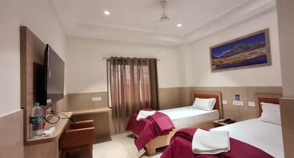 ARUNACHAL RESIDENCY Room Type - DELUXE AC ROOM